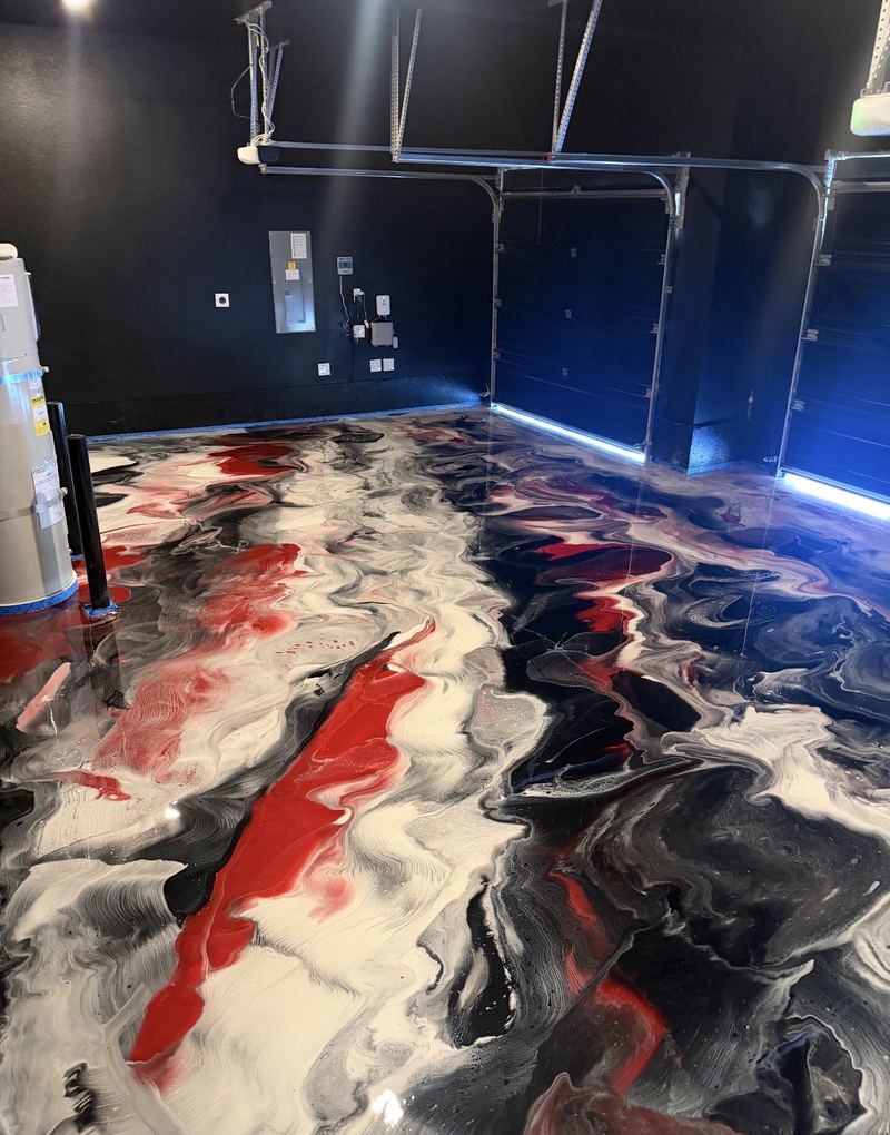 Black, red and white metallic epoxy garage floor