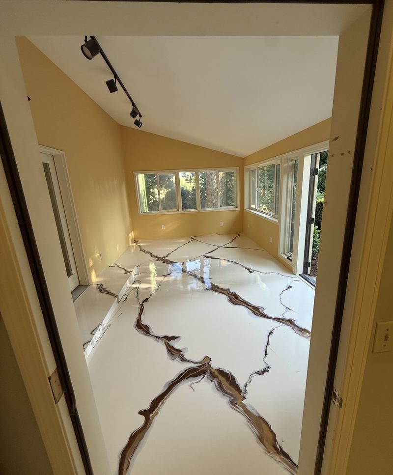 White and tan metallic epoxy sunroom floor