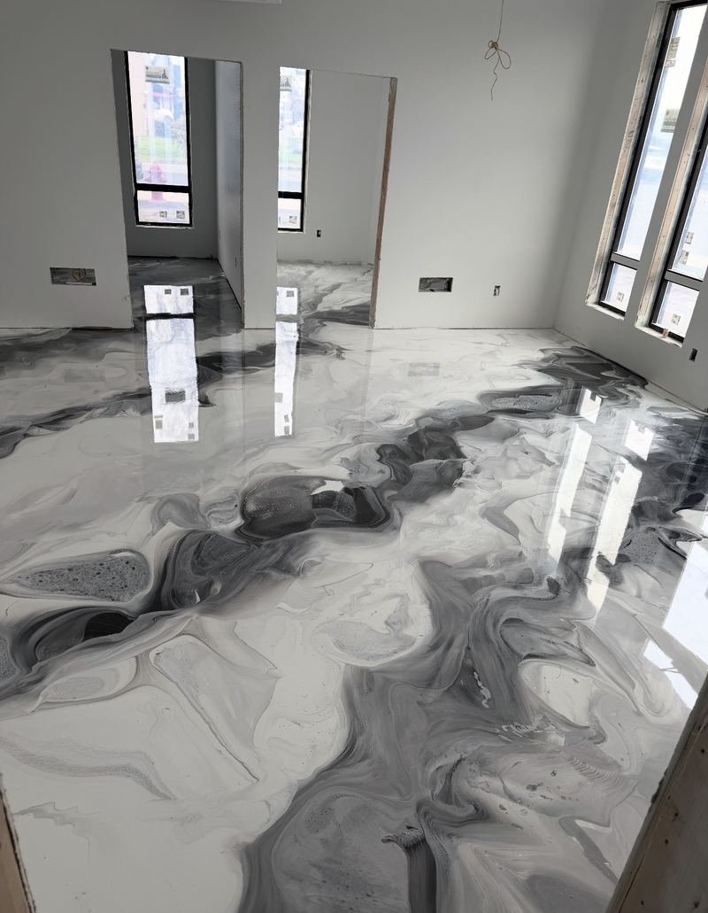 Gray metallic epoxy great room floor