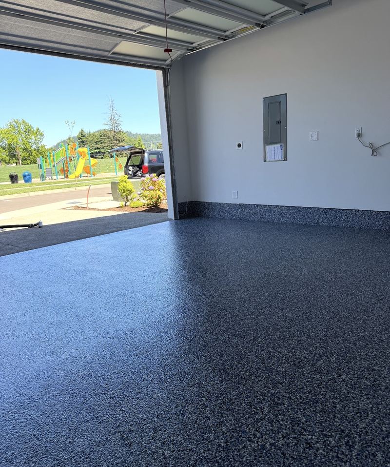 Dark blue flake epoxy garage floor